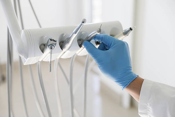 Professional Tooth Extraction technician working in South Bay, FL